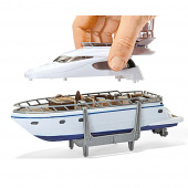Siku Super 1:87 - MAN Heavy haulage transporter with yacht Siku Super 1:87 - MAN Heavy haulage transporter with yacht
